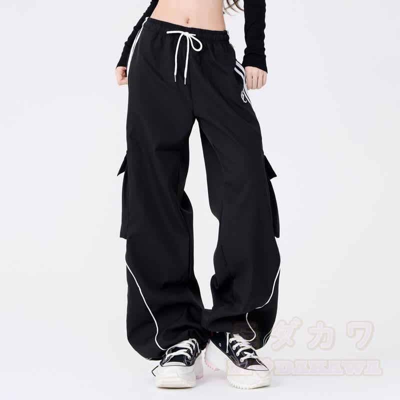 Zweiteiliges Set bestehend aus Hoodie mit Streifenmuster und Cargohose mit weitem Bein und Cargohose mit Cargo-Motiv und Hasenprint - image 6