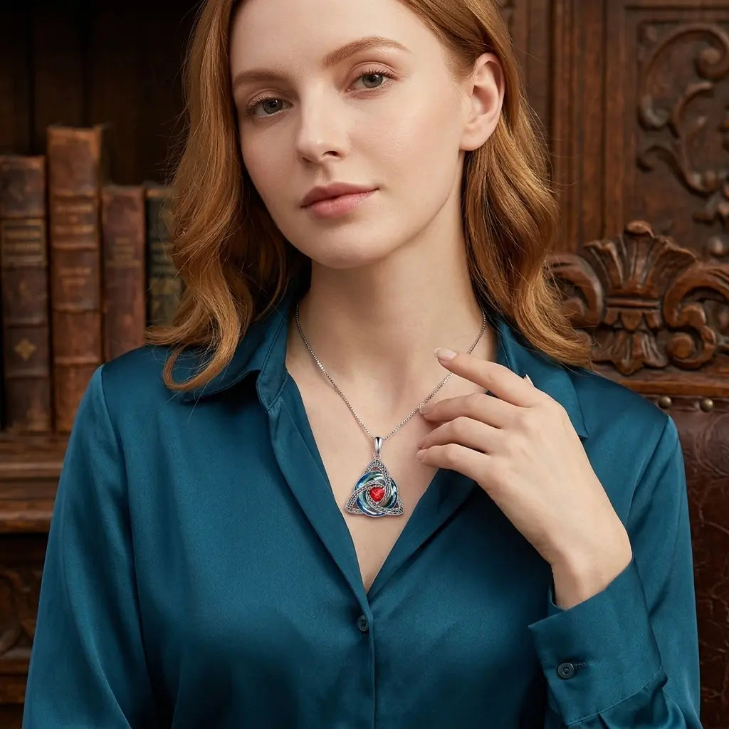 Celtic birthstone necklace worn with everyday outfit