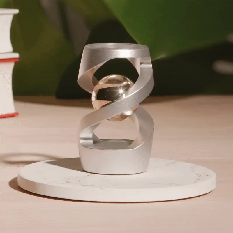 🔥🔥RUILBER - Gravity Defying Kinetic Desk Toy
