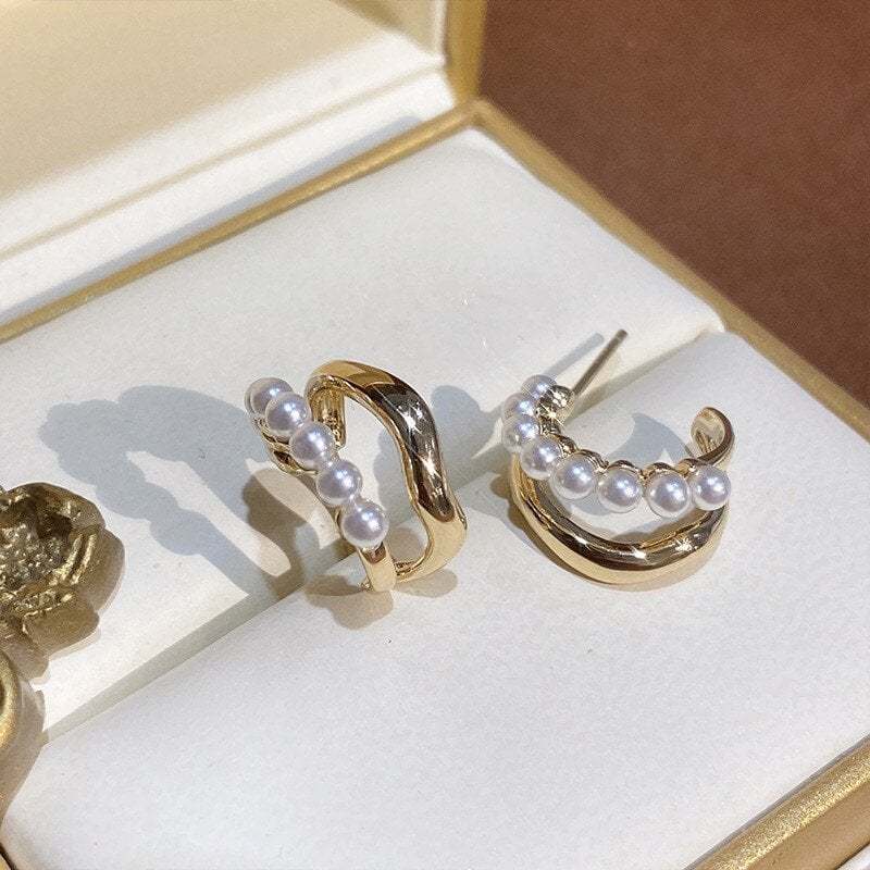 Double wavy pearl ear riser-tidenox