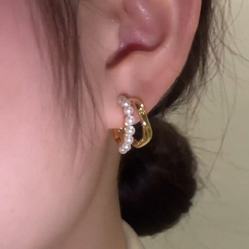Double wavy pearl ear riser-tidenox