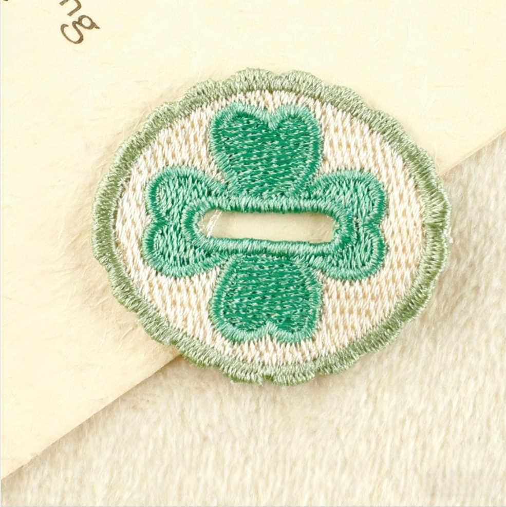 Hand-embroidered petal button hook decoration