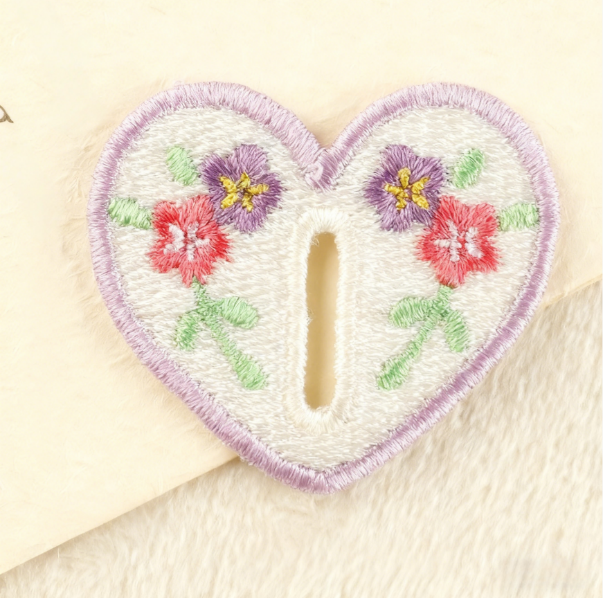 Hand-embroidered petal button hook decoration