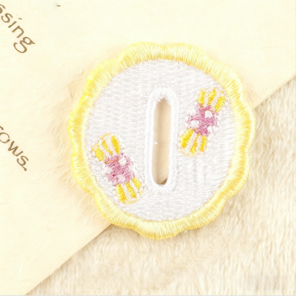 Hand-embroidered petal button hook decoration