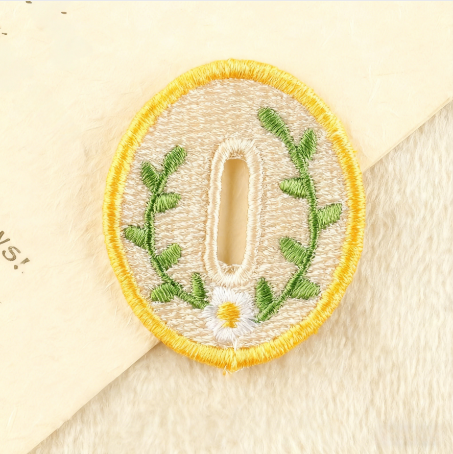 Hand-embroidered petal button hook decoration