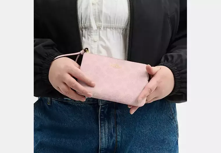 Corner Zip Wristlet In Signature Canvas