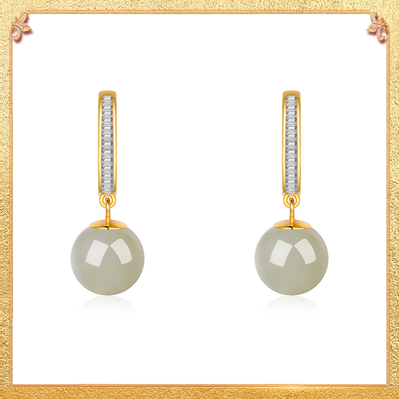 close-up shot display of the pearl-like jade earrings