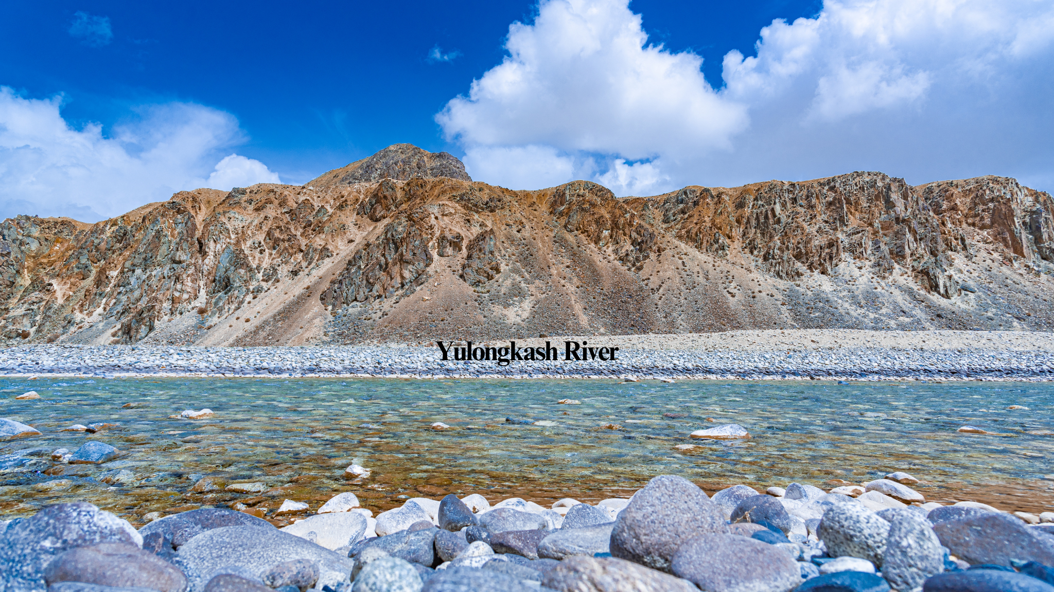 {"default":"Yulongkashi River is the hometown of Hetian Yu. "}