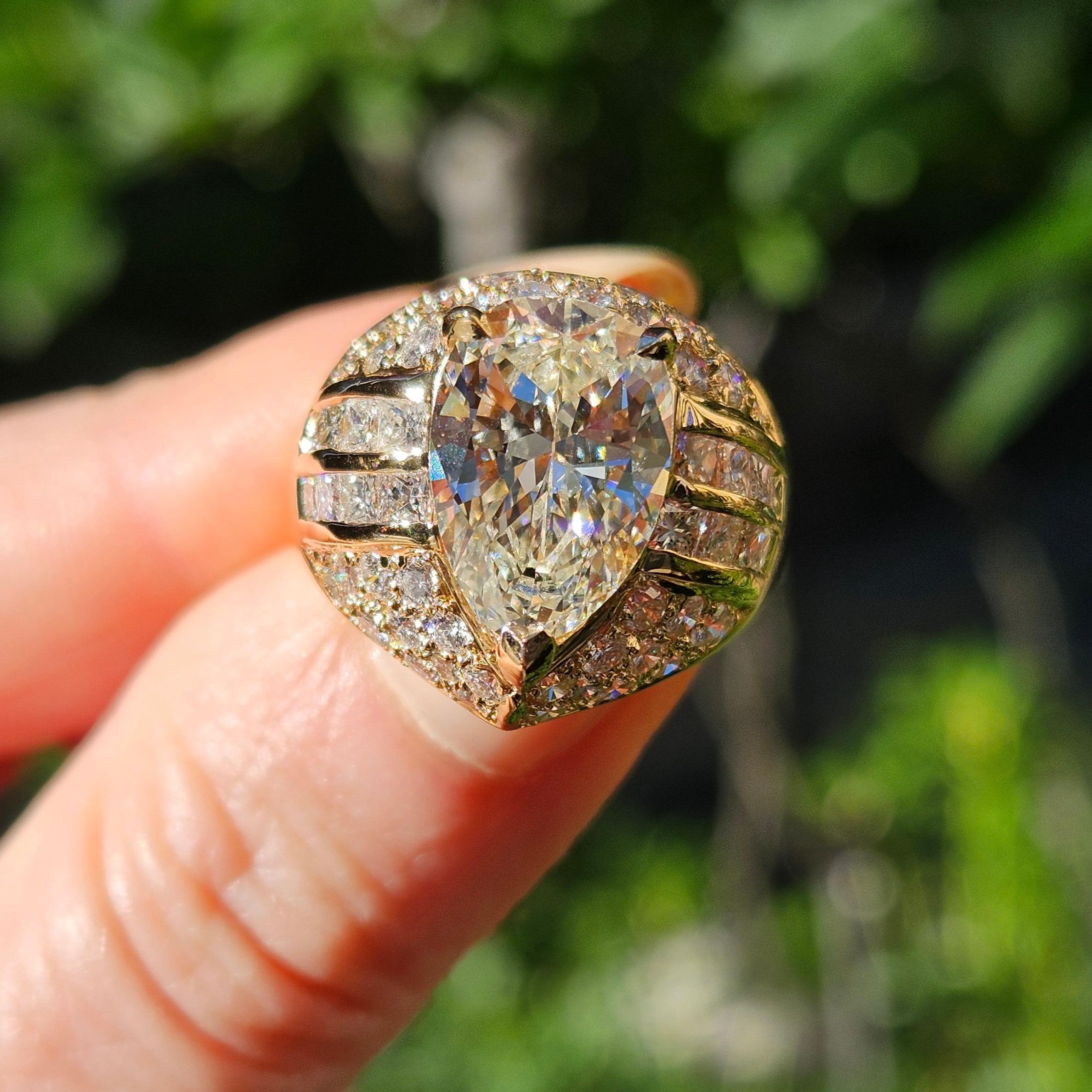 6.50 carat vintage pear-shaped diamond engagement and wedding ring