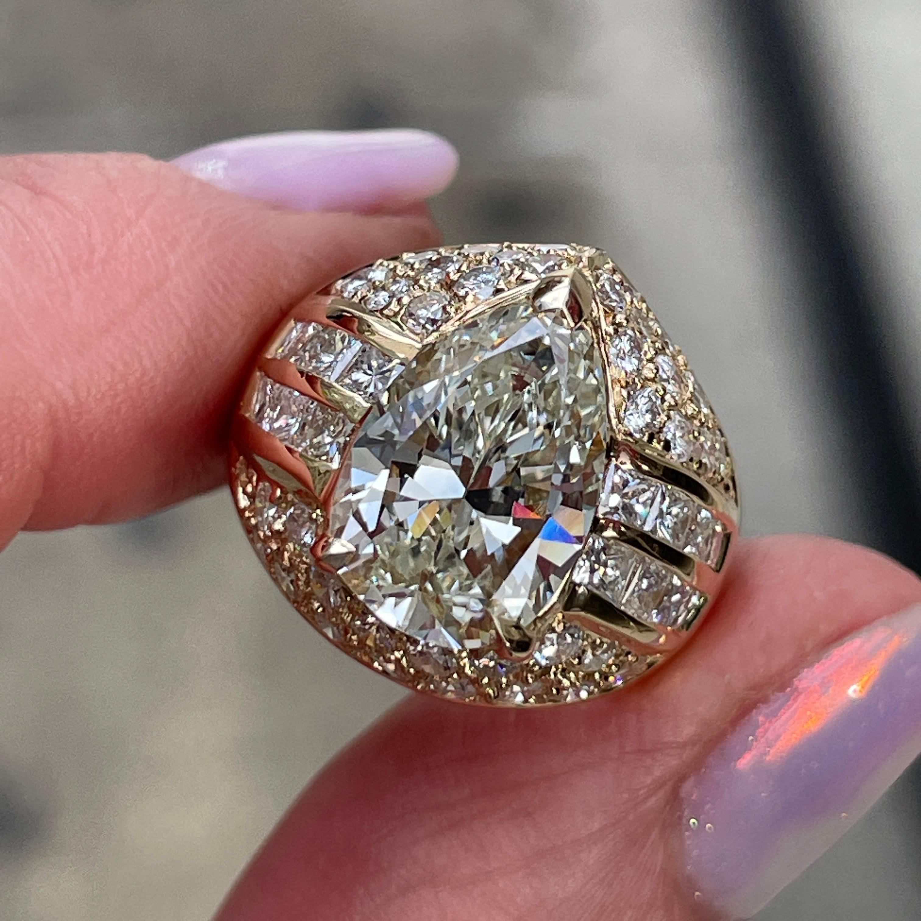 6.50 carat vintage pear-shaped diamond engagement and wedding ring