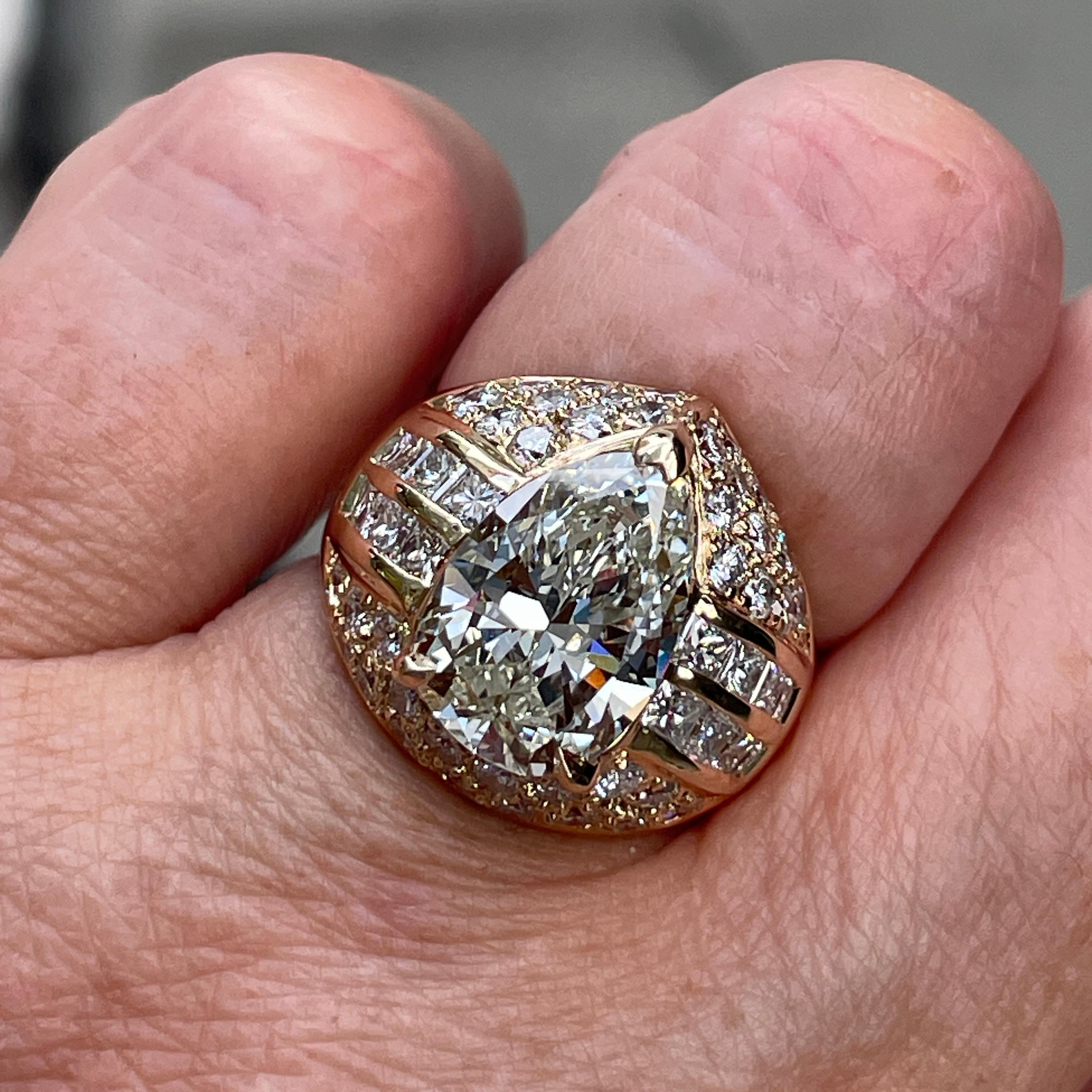 6.50 carat vintage pear-shaped diamond engagement and wedding ring