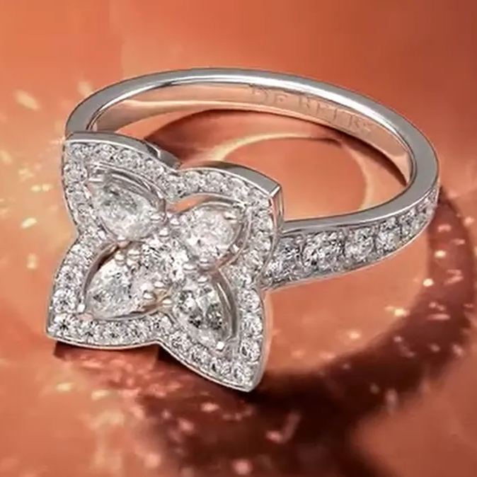Floral Radiance Diamond Halo Engagement Ring