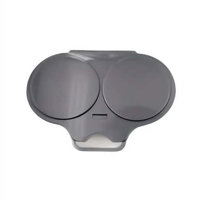 A dark gray plastic dual-cup holder or organizer with two circular compartments and a small rectangular slot in the center, shown on a plain white background.
