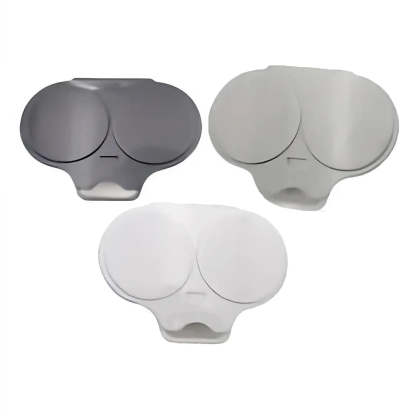 Three oval-shaped replacement lens covers for eyeglasses shown in dark gray, light gray, and white, arranged on a plain white background.