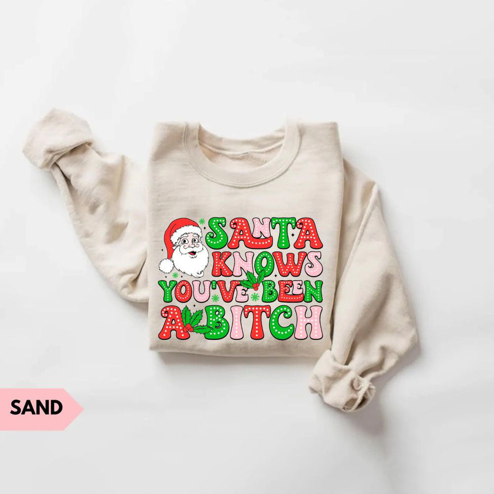 Santa Knows You’ve Been A B*tch – Humorous Christmas Graphic Shirt