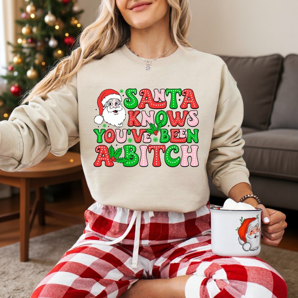 Santa Knows You’ve Been A B*tch – Humorous Christmas Graphic Shirt