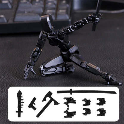 Black articulated sci-fi mecha action figure posed kneeling on a dark textured surface, with interchangeable weapon pieces and extra hands shown in a white panel at the bottom. A blurred keyboard is visible in the background.