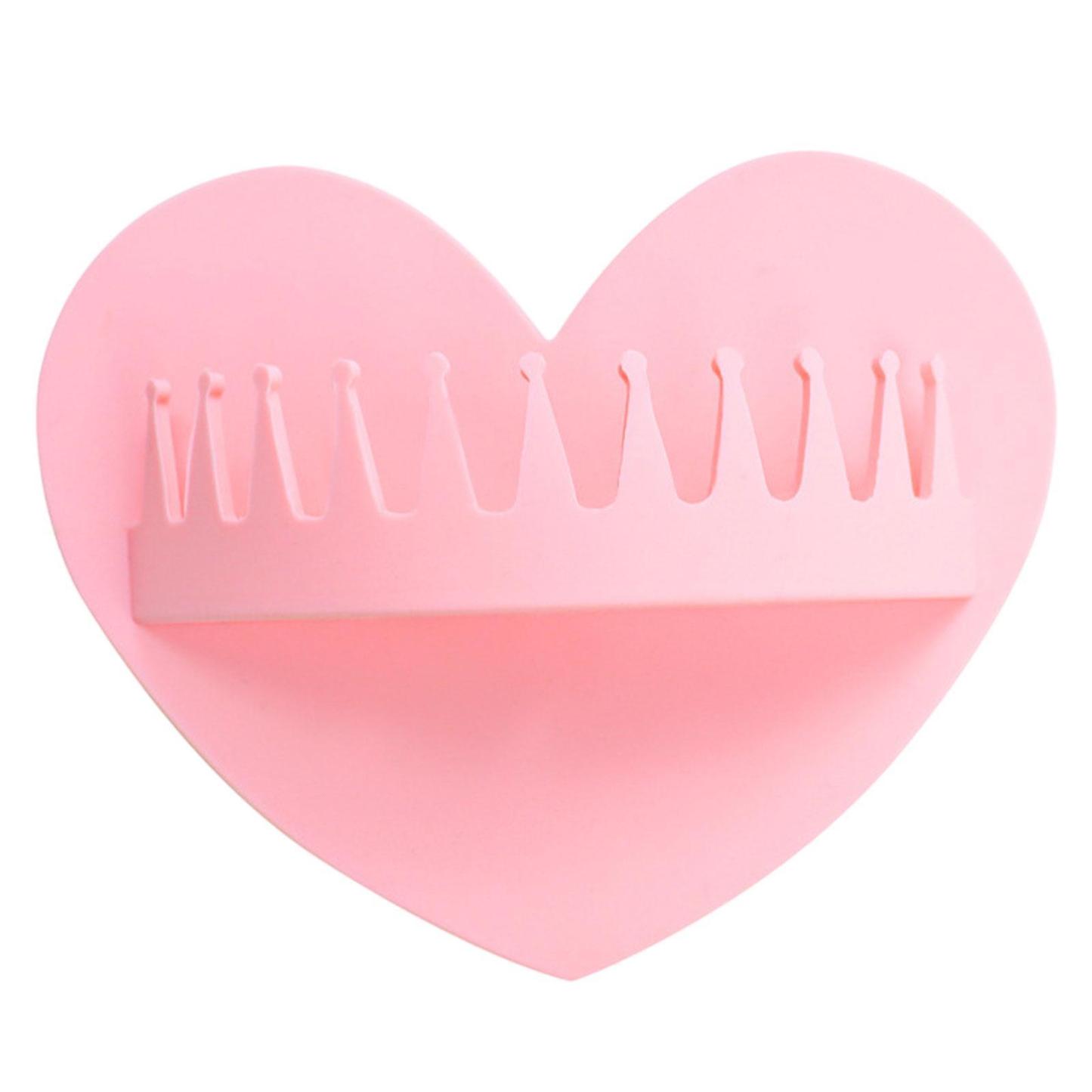 Wall-mounted suction cup hair collector