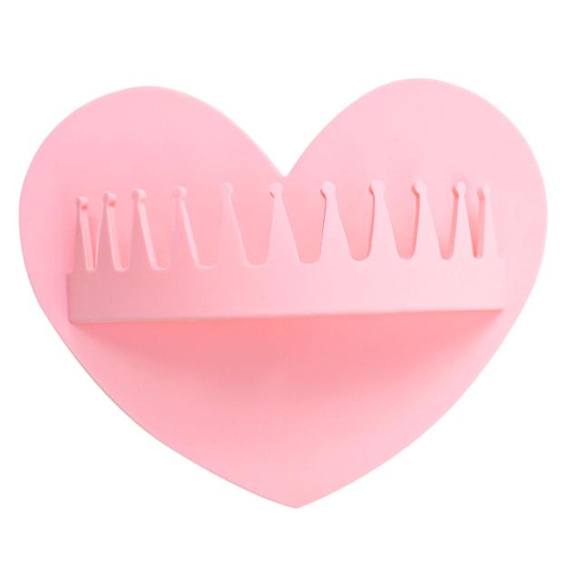 Wall-mounted suction cup hair collector