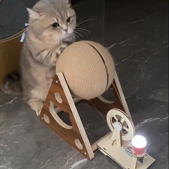 Cat scratching ball hand crank generator