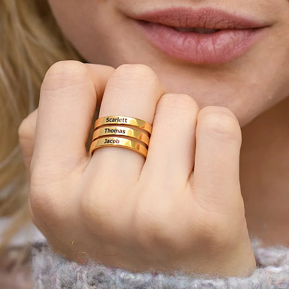 Customized three-ring name rings.