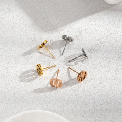 Customized round stud earrings with three letters.