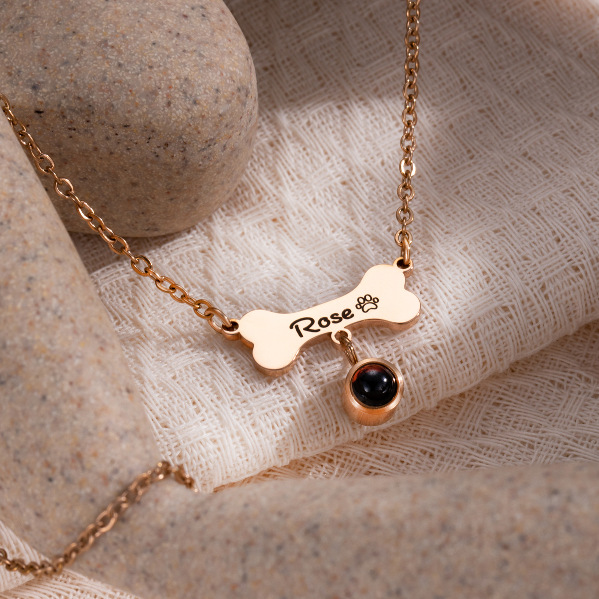 Customized Necklace with Engraved Name on a Dog Bone-shaped Projection Stone 