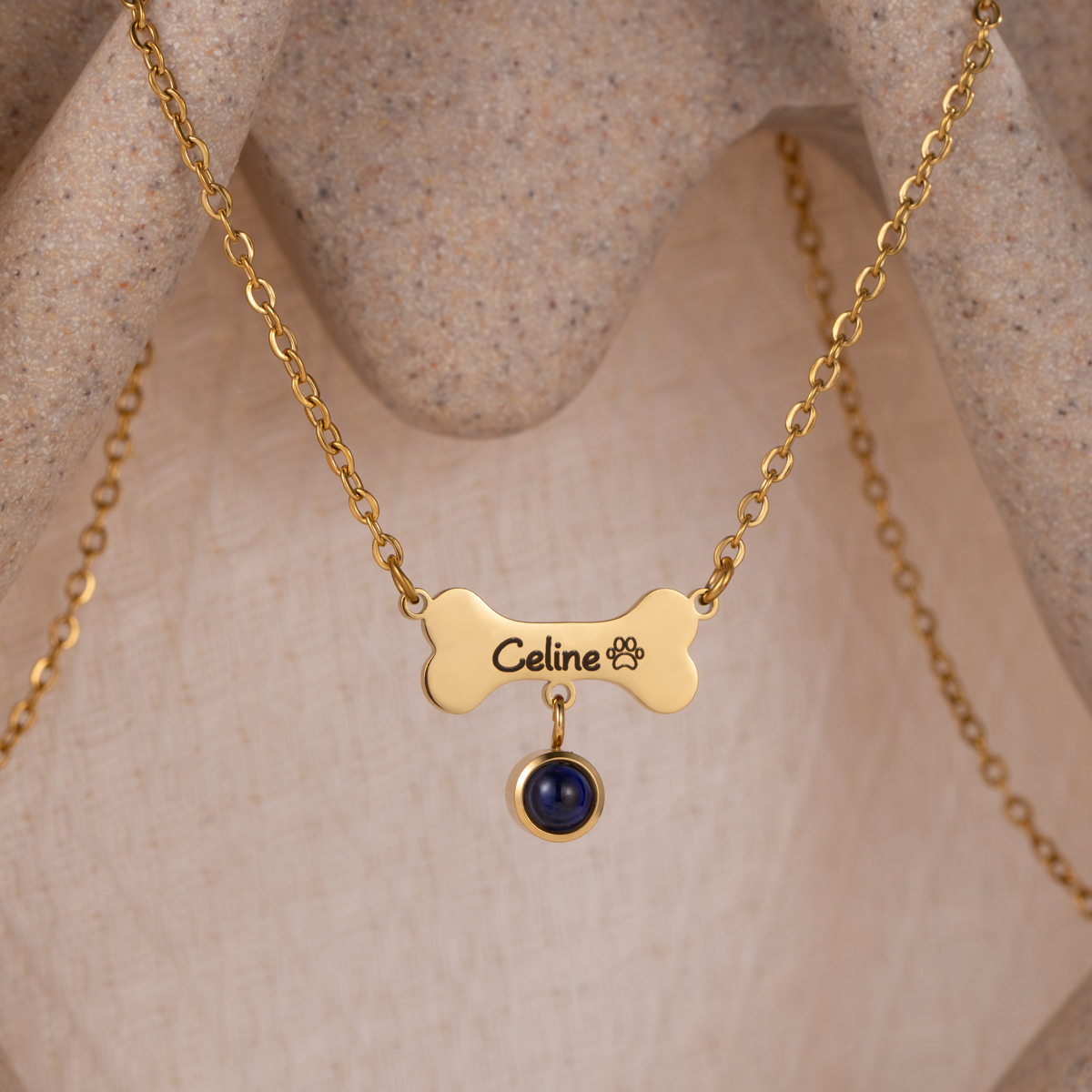 Customized Necklace with Engraved Name on a Dog Bone-shaped Projection Stone 