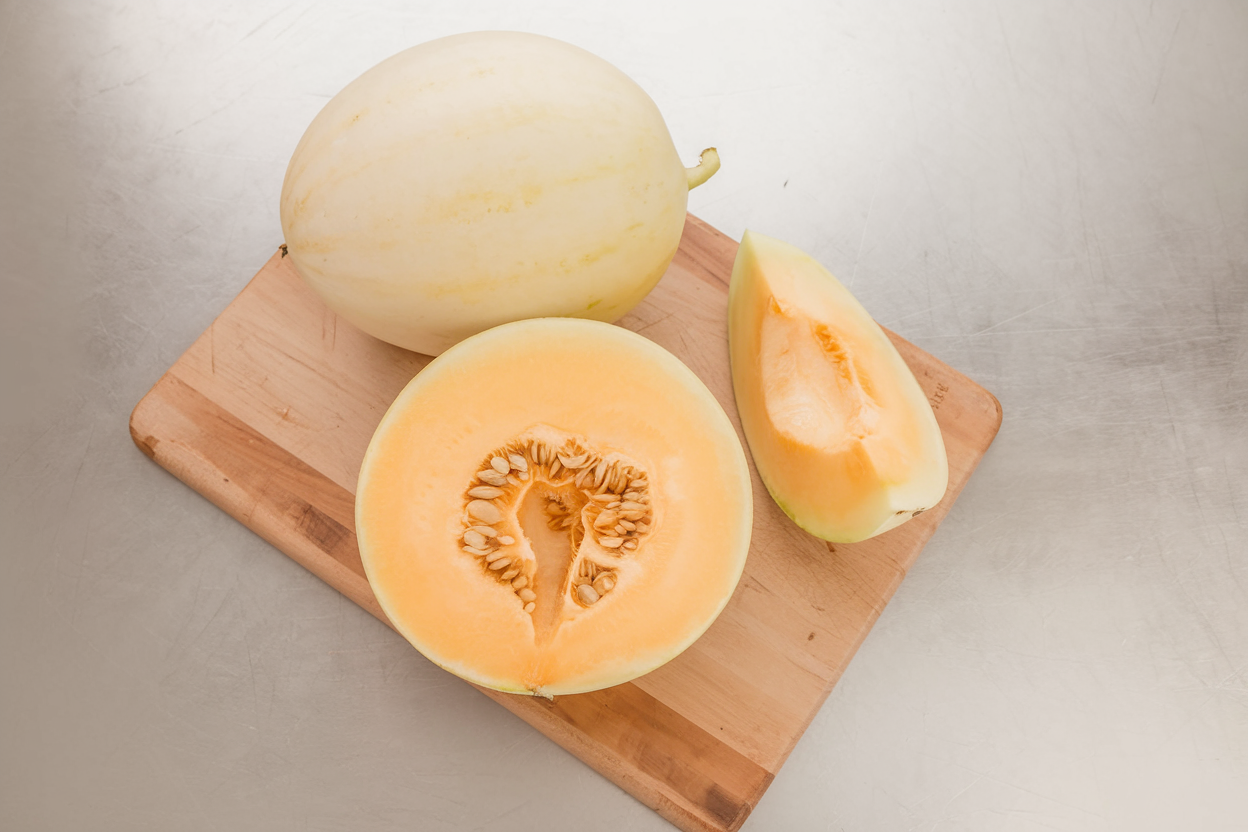 Organic Honey Orange melon seeds, perfect for growing juicy and sweet melons