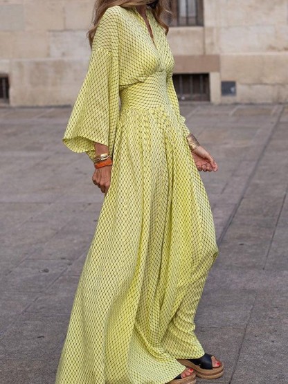 Flowy Printed Maxi Dress with Smocked Waist and Flared Sleeves
