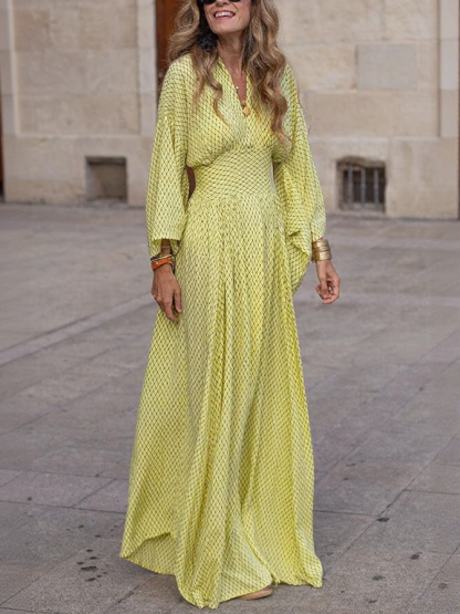 Flowy Printed Maxi Dress with Smocked Waist and Flared Sleeves