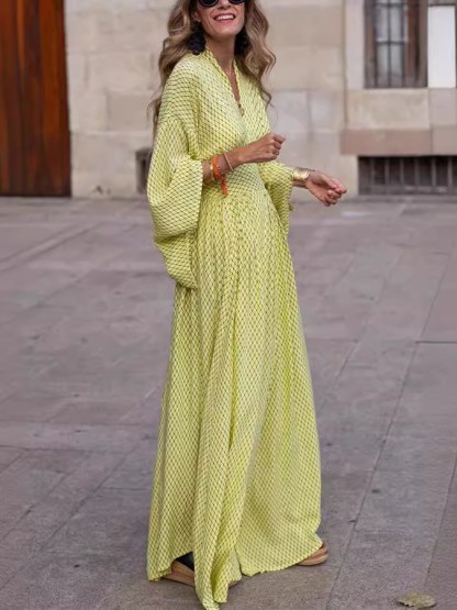 Flowy Printed Maxi Dress with Smocked Waist and Flared Sleeves