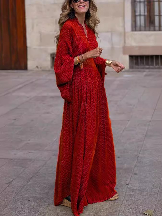 Flowy Printed Maxi Dress with Smocked Waist and Flared Sleeves