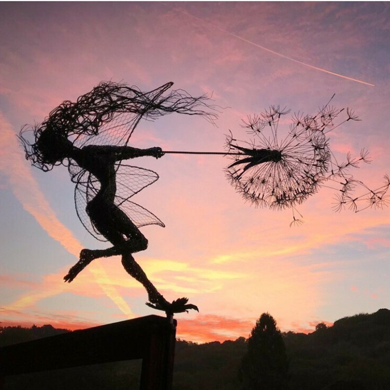Premium Fairies And Dandelions Dance Together
