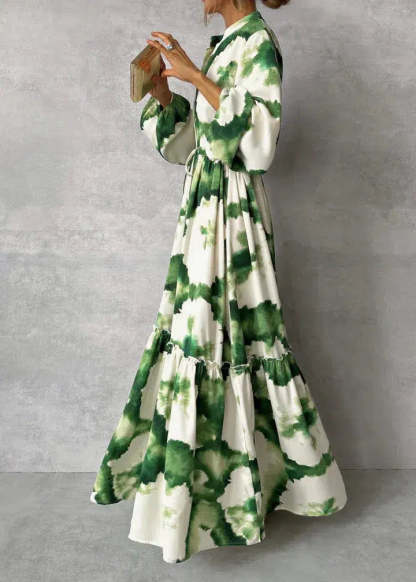 Elegant green maxi dress with v-neckline and long sleeves