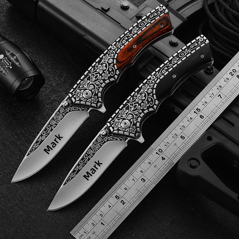 Artisan crafted Damascus steel rose embossed folding knife