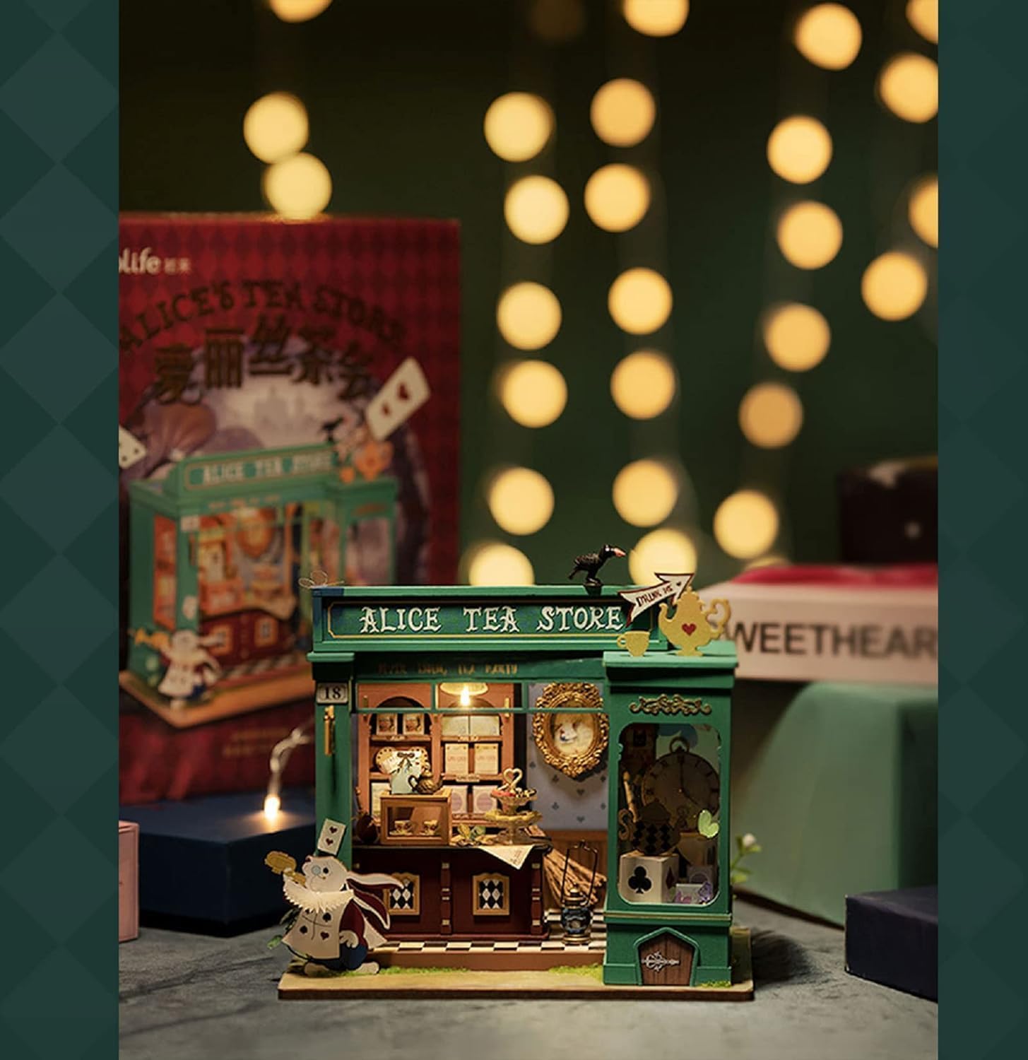 Rolife Alice's Tea Store DIY miniature house kit fully assembled with LED lights glowing in a cozy dark setting-uFunSpace