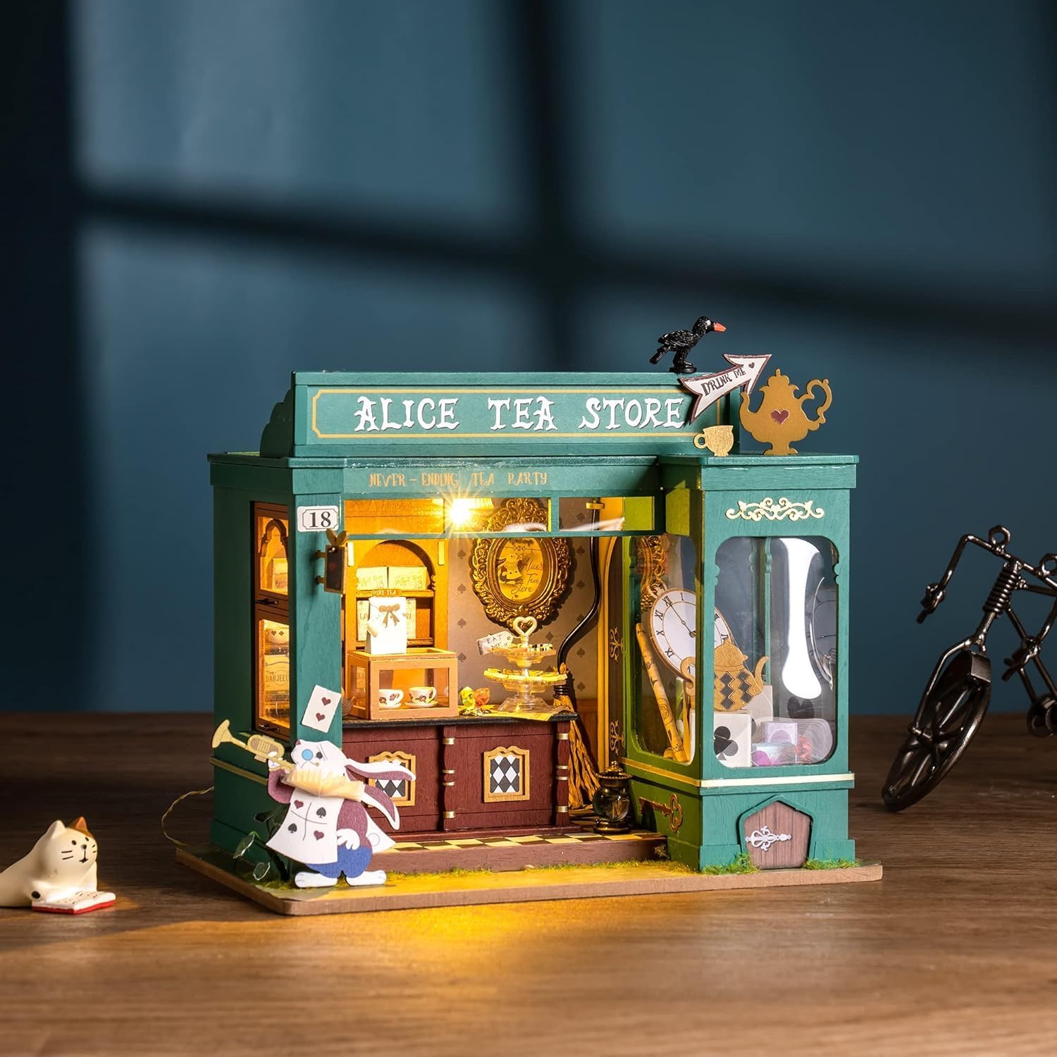 Rolife Alice's Tea Store DIY kit completed model displayed with original packaging box, suitable for Christmas or birthday gifts.-uFunSpace