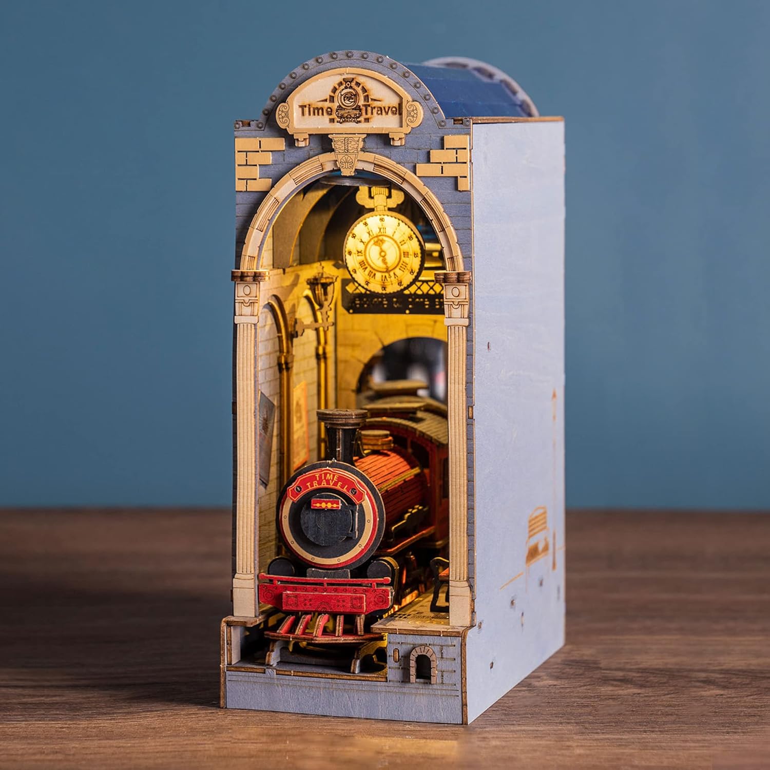 Side view of the assembled Time Travel Bookend, showing the depth of the tunnel and the realistic train model structure.-uFunSpace