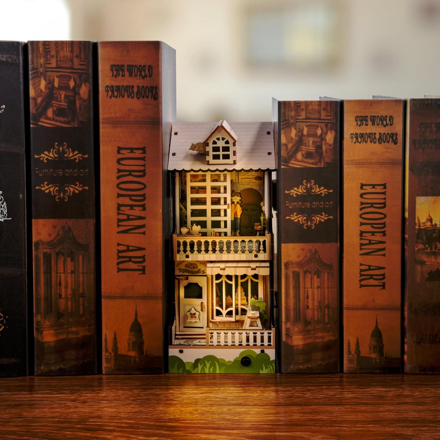 Illuminated Coffee Shop Book Nook acting as a stylish bookend with warm LED lights in a dark room-uFunSpace
