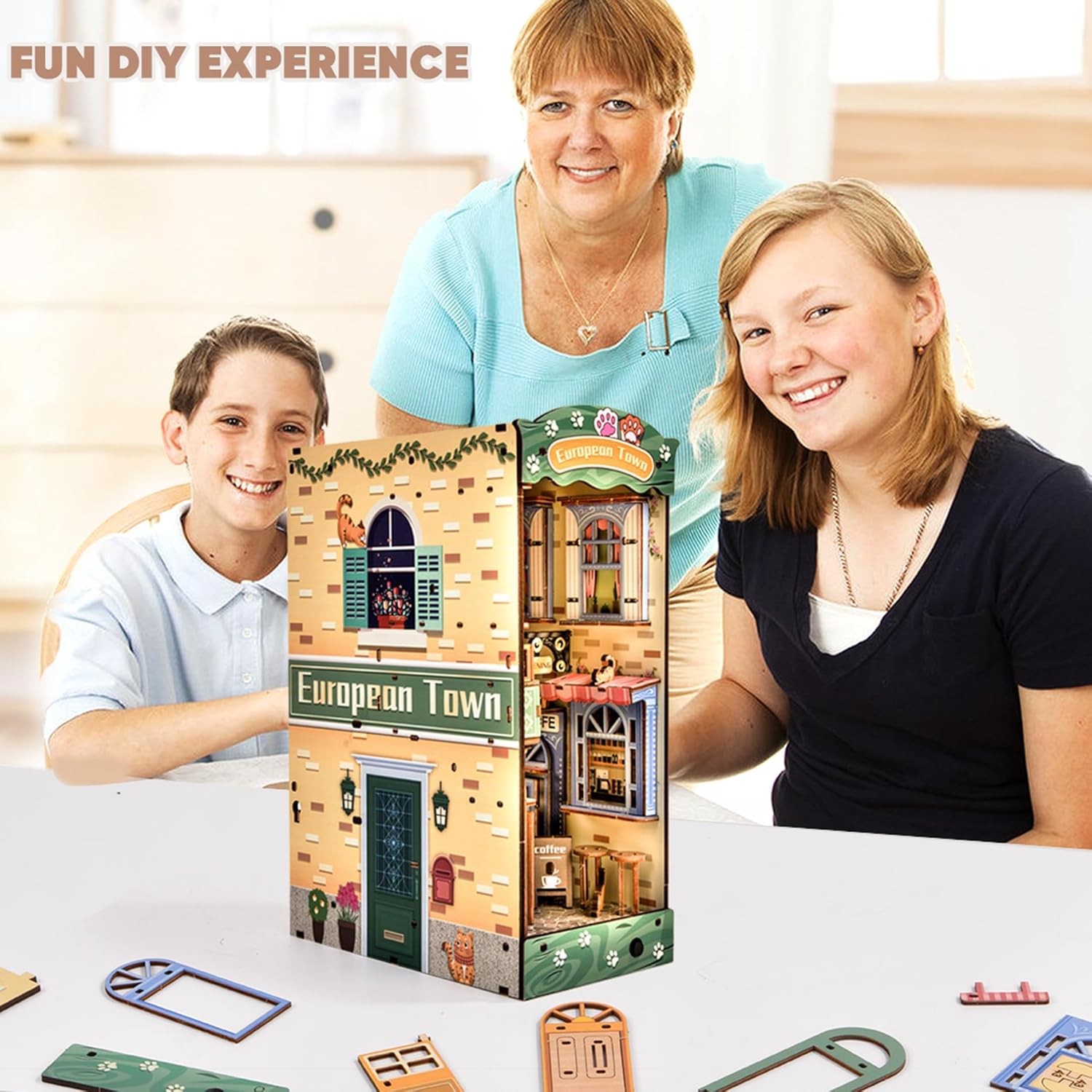 Happy family enjoying the DIY experience with the Cat Street Gallery Book Nook kit, showing it as a fun educational puzzle for teens and adults.-uFunSpace