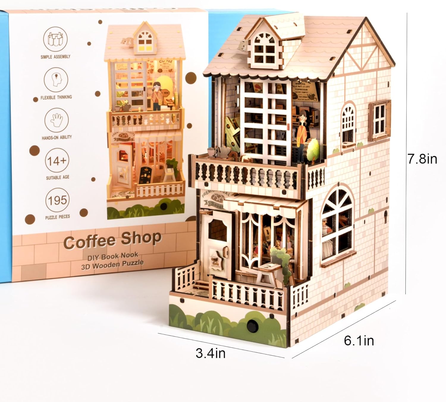 Close-up of the Coffee Shop Book Nook featuring a miniature bakery window, a cat on the roof, and a girl figure.-uFunSpace