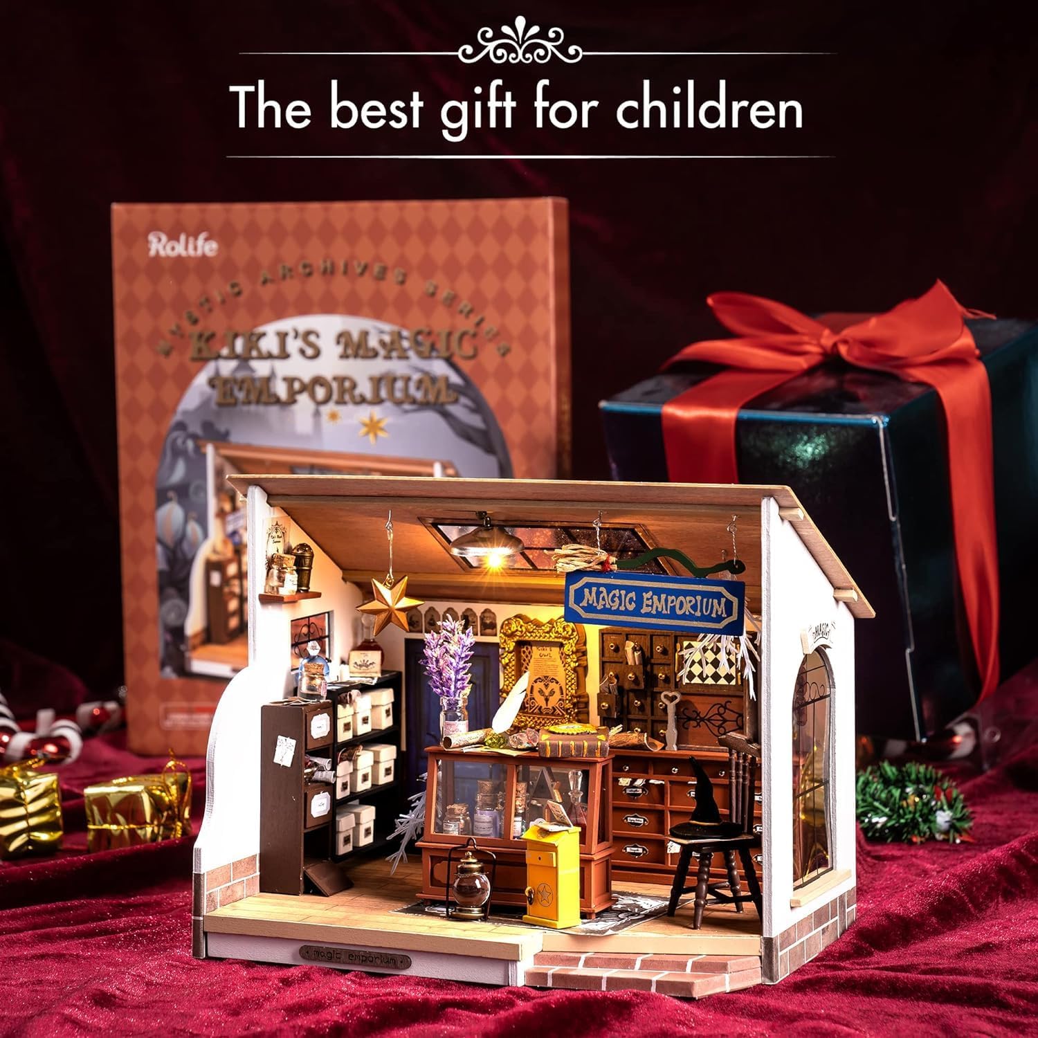 Rolife Kiki's Magic Emporium product packaging box next to a wrapped gift, ideal DIY craft present for teens and adults-uFunSpace