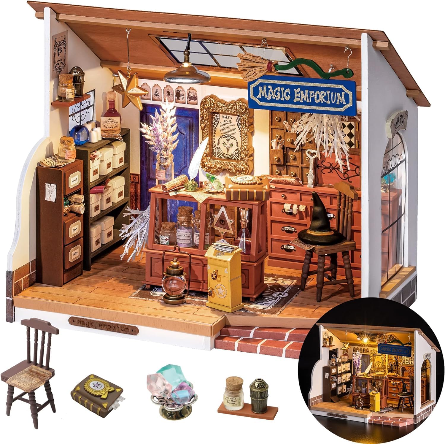 Completed Rolife Kiki's Magic Emporium DIY miniature house kit with LED lights glowing, displayed on a vintage book with fantasy background.-uFunSpace