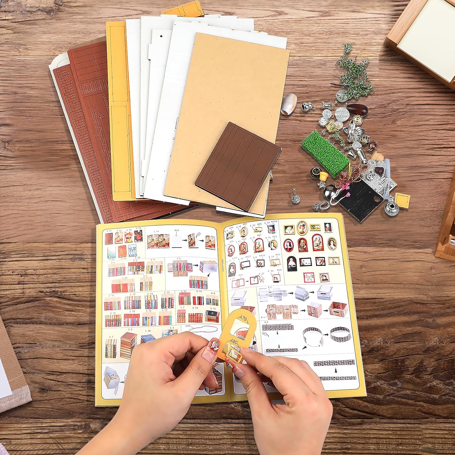 Unboxing the Magic Book Store DIY kit: pre-cut wooden sheets, miniature accessories, beads, tools, and colorful English instruction manual.-uFunSpace