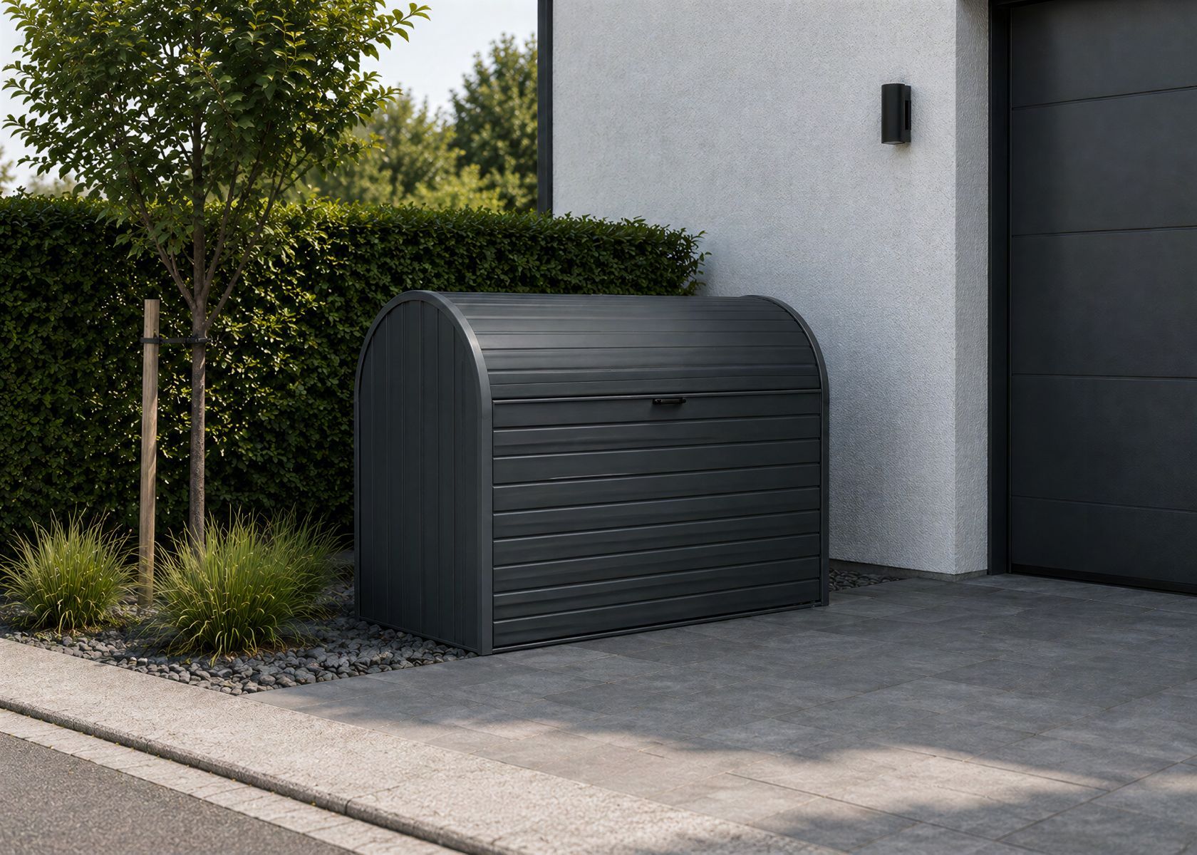 Anthracite roll-top metal bike store for two bikes outside a modern home