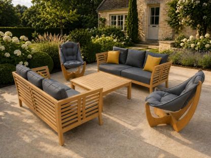 Kangaroo and Paris teak outdoor lounge suite with dark grey cushions in a landscaped garden