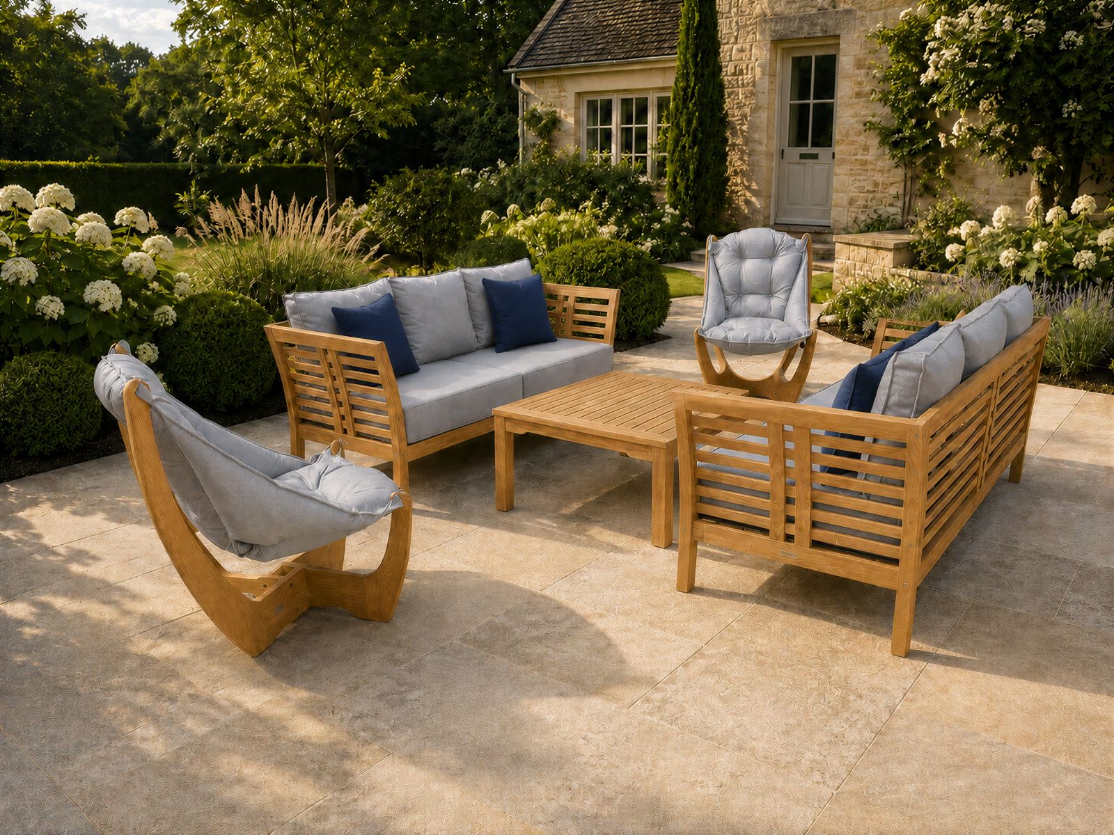 Kangaroo and Paris 6 seater teak garden lounge suite with light grey cushions on a garden patio