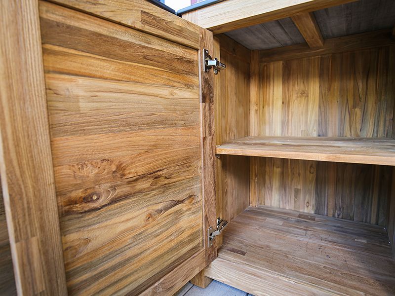 Interior storage space of Bari double door teak outdoor kitchen cabinet with shelf