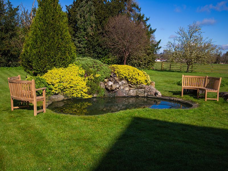 Contour Curved Bench | With Arms-Garden Furniture Centre-MidInstock,instock,MidRange,Benches,Teak Benches Benches,Curved Benches,Teak,Teak Benches-{collection_title}